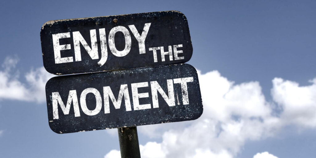 enjoy the moment sign